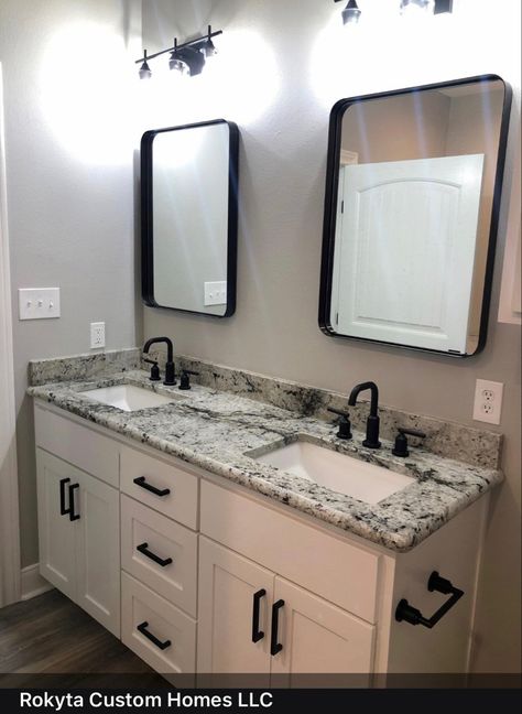 White Bath Vanity With Black Hardware, Granite Backsplash Bathroom, Black And White Granite Countertops Bathroom, White Cabinets Black Hardware Bathroom, Bathroom Granite Ideas, Black And White Granite Bathroom, Black Counter Top Bathroom, Granite Countertops Bathroom Vanities, White Granite Bathroom Vanity