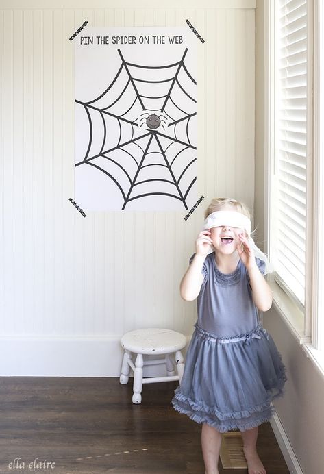 Pin the Spider on the Web | Free Printable - This post is sponsored by GraphicStock.com. It has been such a hot summer here, and I have been oh so pregnant, that I am already dreaming of all things Fall! I had this idea for a free printable "pin the spider on the web" game for all of the upcoming Halloween carnivals and parties that you may be throwing, so I set to work designing one! I always loved "pin the tail on the donkey" when I was a kid, so I thought this would be a fun spin on that #... Ella Claire, Diy Halloween Dekoration, Halloween Arts, Fun Halloween Party Games, Preschool Room, Halloween Donuts, Pin The Tail, Fun Halloween Games, Halloween Class Party