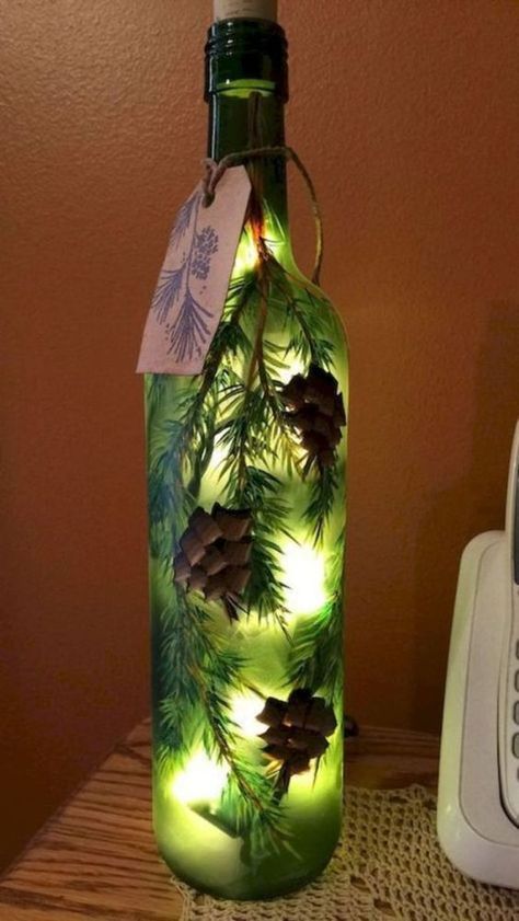 Beautiful Lighted Bottles | creativeartworksblog Wine Bottle Project, Hand Painted Wine Bottles, Glass Bottle Diy, Wine Craft, Christmas Wine Bottles, Diy Glass Bottle Crafts, Wine Bottle Art, Wine Bottle Diy Crafts, Glass Bottles Art