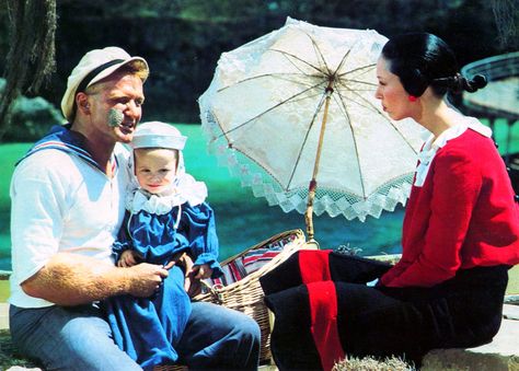 "Popeye" movie still, 1980. L to R: Robin Williams as Popeye, Wesley Ivan Hurt as Swee'Pea, Shelley Duvall as Olive Oyl. Robin Williams Popeye, Popeye Movie, Shelley Duvall, Royal Gala, Popeye And Olive, Popeye The Sailor Man, Olive Oyl, Life In Pictures, Good Will Hunting