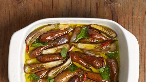 A recipe for preserving eggplants by roasting them slowly in olive oil and jarring them with basil or mint Eggplant Confit, Preserving Eggplant, Canning Eggplant, Confit Recipes, Preserving Vegetables, Cream Soup Recipes, Eggplant Dishes, Roast Eggplant, Pickled Veggies