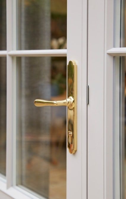 French door brass handle Modern Orangery, Gold Door Handles, White French Doors, French Closet Doors, Patio Door Handle, Westbury Gardens, Dining Seating, Door Handles Interior, Black Door Handles