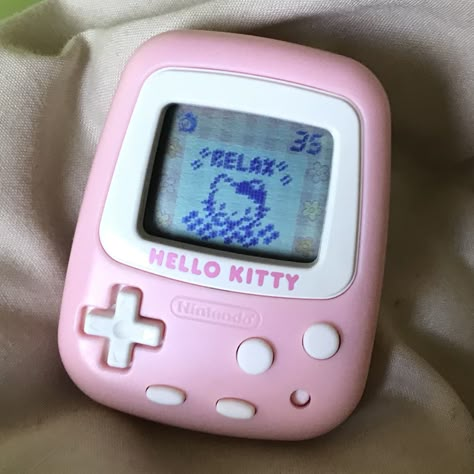 Hello Kitty reminds you all to take some time off to relax! Giga Pet, Cute Tech, Kitty Aesthetic, Hello Kitty Aesthetic, Retro Gadgets, Virtual Pet, Hello Kitty Stuff, Hello Kitty Collection, Hello Kitty Pictures