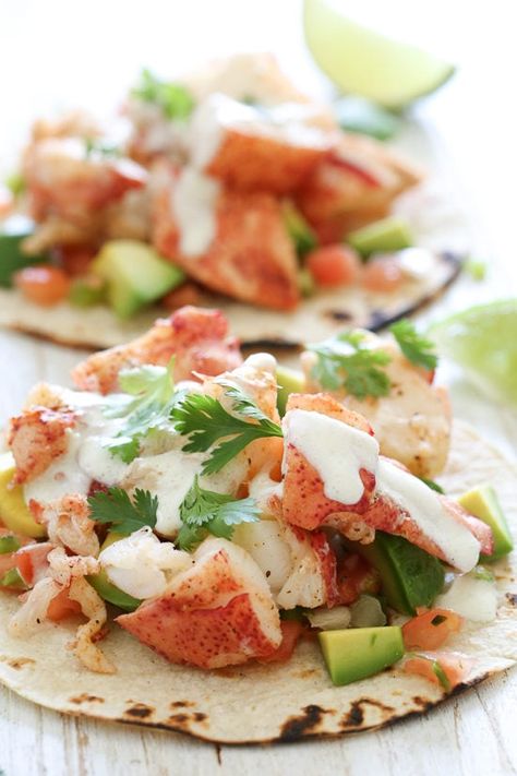 These lobster tacos are made with steamed chunks of lobster meat lightly seasoned with Old Bay, avocado and pico de gallo, topped with a spicy poblano crema. If you want to step up your fish taco game, you need these in your life! Poblano Crema, Lobster Tacos, Fish Taco, Lobster Meat, Lobster Recipes, Shrimp Tacos, Skinny Taste Recipes, Salad Dressings, Seafood Dishes