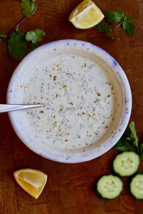 Raita is an Indian yoghurt sauce made with cucumber and mint. My Vegan Raita is made with dairy free yoghurt. It is a super simple recipe and the perfect cooling condiment to serve with curry. Indian Yogurt Sauce, Red Lentil Dahl Recipe, Indian Yogurt, Indian Cucumber, Cucumber Yogurt Sauce, Dahl Recipe, Yoghurt Sauce, Vegan Sauce Recipes, Curry Easy