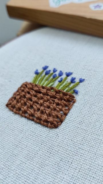 Hasna | Hand Embroidery 🪡 on Instagram: "A basket of flowers ✨✨" Basket Weave Embroidery, Flower Basket Embroidery, Cane Baskets, Stitch Stuff, Hand Stitches, Basket Of Flowers, Ribbon Embroidery, Flower Basket, Embroidery Flowers