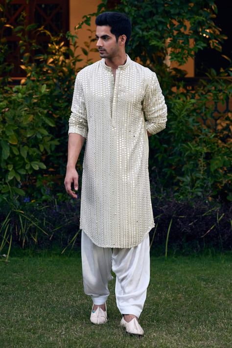 Buy Purple Net Embroidery Sequin Tanha Interstellar Short Kurta With Pant For Men by Mahima Mahajan Online at Aza Fashions. Kurta Man Design For Men, Indian Groomsmen Outfits For Men, White Kurta Pajama Men Weddings, Ivory Kurta For Men, Mens Kurta Designs Style Indian Weddings, Off White Kurta For Men, Semi-stitched Long Sleeve Bandhgala With Mirror Work, Long Sleeve Kurta With Mirror Work For Eid, Traditional Long Sleeve Sherwani With Gota Work