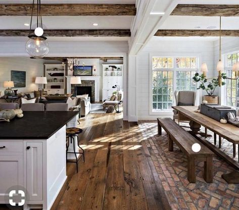 Do you love dreamy classic timeless rustic meets modern spaces like we do? Click through to see our collection of classic homes where rustic farmhouse meets chic + modern maison. Think crisp white walls and exposed timber beams. Think copper decor + hardware, worn wood floors, and plants. We think Joanna Gaines would approve of these dreamy kitchens, living rooms, bedrooms, bathrooms, and exteriors. #modernfarmhouse #rusticmodern Sliding Back Door, Corner Of Kitchen, Modern Chic Living Room, Dream House Ideas Kitchens, Concept Living Room, Open Concept Kitchen Living Room, Salon Shabby Chic, Style Salon, Modern Farmhouse Living