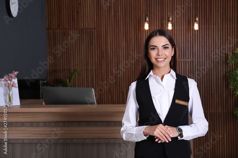 Stock Image: Portrait of receptionist at desk in lobby Hotel Uniform, Japanese Men, Adobe Stock, Lobby, Wedding Makeup, Stock Images, Desk, Stock Photos, Hotel