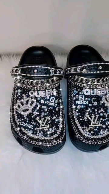 DK KREATIVE KREATIONS on Instagram: "Custom Black & Silver Designer Inspired Crocs Currently Taking Orders DM to purchase #explore #explorepage #reels #fashion #fashionart #designercrocs #smallbusiness #share #repost #viralpost #crocsofinstagram #stylishcrocs #fashionista #womensupportingwomen #womanownedbusiness #amazonfinds  #customcrocs #custom #blingcrocs #custommade #trendingreels #followme" Black Bling Crocs, Black Crocs With Charms, Crocs Business, Bedazzled Crocs, Designer Crocs, Crocs With Charms, Crocs Ideas, Black Crocs, Crocs Fashion