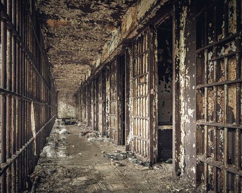 An abandoned location photographer has done time in a haunting, crumbling jail, capturing a series of spooky images. Will Ellis visited the creepy cell block, which still contained the remains of furniture and messages in graffiti. The Essex County Jail, in New Jersey, USA, opened its doors in 1837, and contained a total of 300 cells. It was closed in 1970 and has since become a haven for abandoned photographs who document its decaying state Spooky Images, Haunted Prison, Haunted Images, Abandoned Prisons, Eastern State Penitentiary, Abandoned Asylums, Jail Cell, Urban Explorer, Essex County