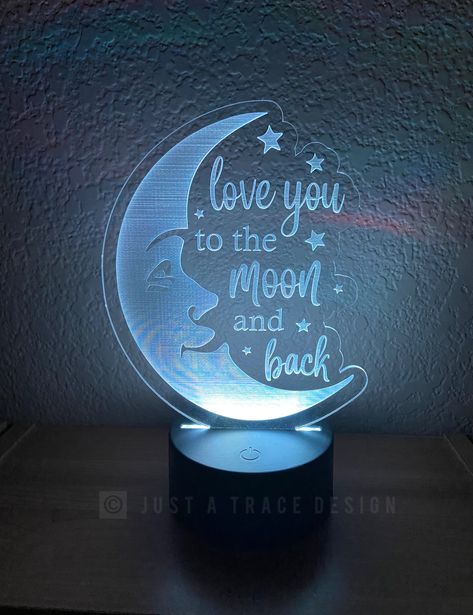 "Love You To The Moon And Back Night Light. This lovely night light makes a wonderful addition to any room. It is laser engraved so you never have to worry about peeling or fading. Each night light is made to order and engraved on clear acrylic. Great for Birthdays, Baby Showers, Baby Gifts and more! Perfect to place on a table, mantle, shelf or desk. Makes the perfect gift or for yourself. Price includes acrylic sign and LED base with remote control that allows you to change the base to multipl Moon Nightlight, Balloon Bouquet Diy, Homemade Signs, Mantle Shelf, Baby Night Light, Led Diy, Acrylic Board, Kids Night, Night Light Kids