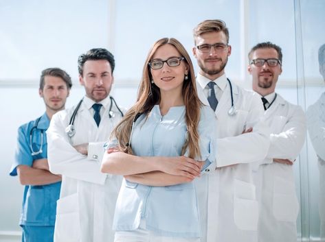 Group of doctors and nurses standing in ... | Premium Photo #Freepik #photo #white-coat #happy-doctor #hospital-staff #doctor-smile Foto Doctor, National Nurses Day, Nutrition Sportive, Acute Care, Staffing Agency, Medical Coding, Nurses Day, Medical University, Elderly Care