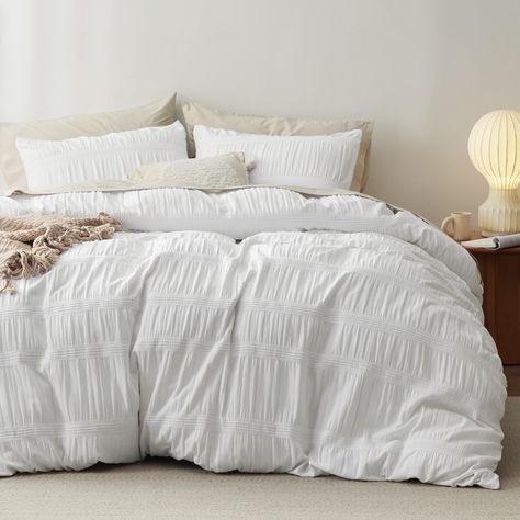 PRICES MAY VARY. Extra Soft: This duvet cover set has been brushed over 12 times in manufacturing to achieve an extra soft hand feel that is gentle on the skin. Enhanced Durability: Crafted from premium polyester microfiber and utilizing Bedsure's unique dyeing technique, this tufted duvet cover set resists fading, shrinking, and seam slippage, even after multiple washes. Convenient Design: Crafted from our premium and extra soft brushed microfiber, this duvet cover set provides coziness night a Elegant Duvet Covers, Boho Duvet Cover, Boho Duvet, King Duvet Cover Sets, White Duvet, Bedding Duvet, White Duvet Covers, Dorm Room Essentials, Quilted Duvet Cover