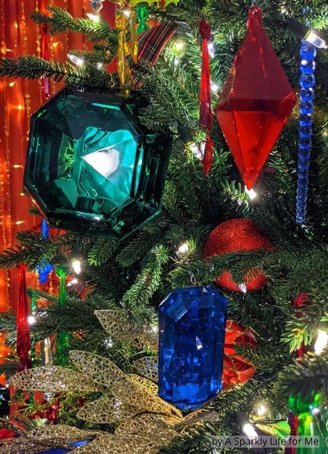 Gems and Jewels Christmas Ornaments - a mix of vintage and new ornaments, finials, and icicles in sapphire blue, emerald green, and garnet red Jewel Christmas Decorations, Jewel Christmas Tree Ornaments, Christmas Tree Large Ornaments, Gem Christmas Tree, Diamond Christmas Tree, Jewel Tone Christmas Tree Color Schemes, Flocked Christmas Tree Decorated Red, Jewel Tone Christmas Decor, Royal Christmas Tree