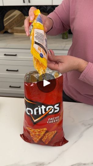 Party Nachos Everyone will Love | Party Nachos Everyone will Love

Danny shows you the most unique way to make deliciously cheesy Party Nachos. | By Danny N’s Kitchen | Alright so I took a whole
entire can of nacho cheese inside my nacho Doritos. I'm
coming in with some pinto beans. I drained and rinse
these. So you want to make sure that you do that. And the pinto
beans are going to add such a great flavor. Look at that.
Doesn't that look amazing? Wait until you see us shake it up.
Yep and we are going to shake this up. Now I'm taking some
Hunt's diced tomatoes. I'm going to be fast here because I
don't want I don't want too much I don't want too many
juices. So I'm just going to get that and put it right on
top. You see that? I used maybe a fourth of this can definitely
you save that for Walking Nachos Doritos, Dorito Nachos, Party Nachos, Nacho Doritos, Nacho Party, Nachos Cheese Recipe, Doritos Nachos, Love Party, Nacho Cheese