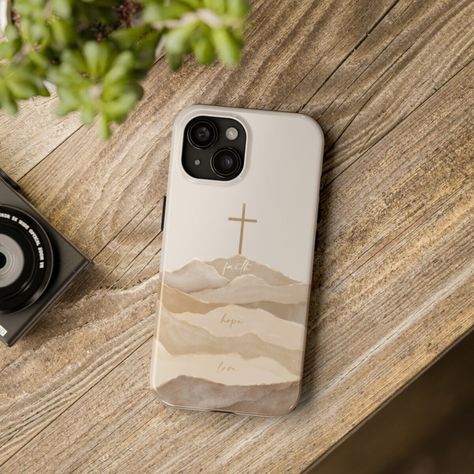 A B O U T  A R T W O R K ✎ Biblical modern and boho watercolor art of the Cross with the words: Faith, Hope, Love ----------------------------------------------------------------------------- P R O D U C T  D E T A I L S ♥ Protect your phone in a Christian-themed tough phone case. This lightweight phone case is impact resistant and comes with the perfect surface to print all your ideas in vivid detail as well as crisp color. Compatible with iPhone 7, 8, X, 11, 12, 13, 14 & more - check our avail Christian Baptism, Boho Watercolor, Cross Christian, Iphone Hard Case, Baptism Gifts, Faith Hope Love, Hope Love, Cute Phone Cases, Christian Clothing