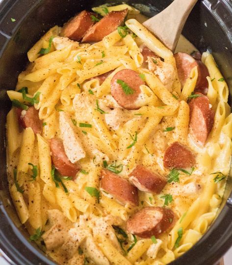 Slow Cooker Cajun Sausage Alfredo Cajun Sausage Alfredo, Cajun Alfredo Recipe, Slow Cooker Cajun Chicken Alfredo, Slow Cooker Cajun, Alfredo With Sausage, Sausage Crockpot Recipes, Sausage Alfredo Pasta, Cajun Sausage Pasta, Sausage Crockpot