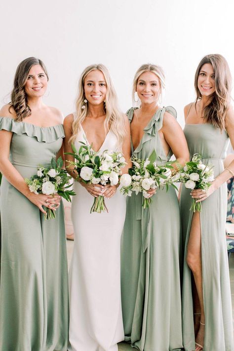 sexy wedding dress with plunging neckline and sage green bridesmaid dresses Sage Green Bridesmaid Dresses, Sage Green Bridesmaid, Simple Wedding Dress Boho, Miami Beach Wedding, Sage Bridesmaid Dresses, Sage Green Bridesmaid Dress, Boho Beach Wedding, Beach Wedding Dress Boho, Sage Green Wedding