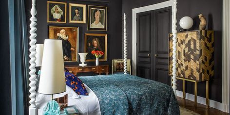 This elegant Parisian bedroom boasts walls coated in a custom slate-colored paint and the portraits are from the 16th century through the 1960s. Rust Bedroom, Bedroom Color Palette, Charcoal Bedroom, Guest Bedroom Design, French Interior Design, French Style Homes, Serene Bedroom, Grey Bedroom, Grey Furniture