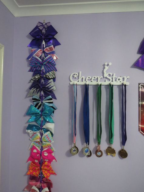 Cheer Award Display Ideas, Cheer Wall Ideas, Cheer Trophy Display Ideas, Cheer Showcase Ideas, Cheer Bows Display Ideas, Cheerleading Medal Display Ideas, Cheer Bow Holder Diy, Display Cheer Bows, Cheer Metal Display Ideas