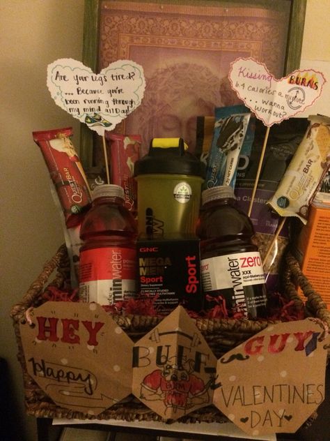 Valentine's Day basket for your "gym rat" boyfriend. Gym Rat Boyfriend, Diy Valentine's Gift Baskets, Coffee Lover Gifts Basket, Valentines Day Baskets, Gift Baskets For Him, Date Night Gifts, Valentine Gift Baskets, Boyfriend Gift Basket, Valentine's Day Gift Baskets