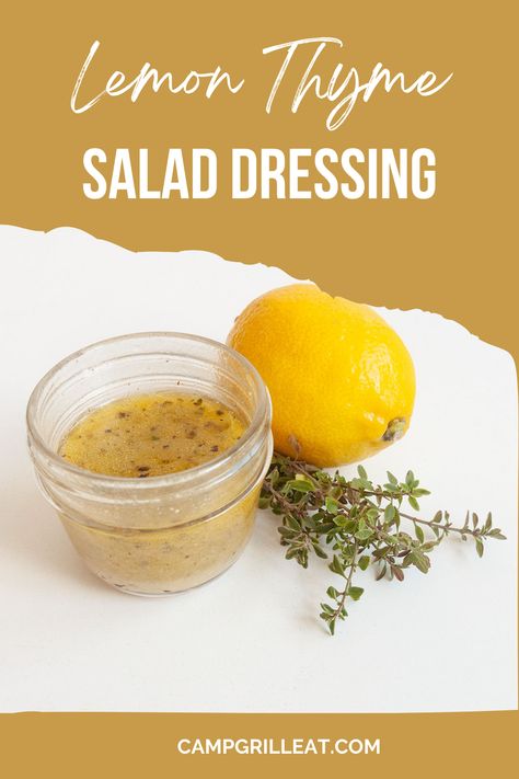 A jar of lemon salad dressing with a lemon and some thyme next to it. Lemon Thyme Dressing, Lemon Thyme Vinaigrette, Quick Chicken Marinade, Thyme Vinaigrette, Harvest Salad Recipes, Grilled Beets, Camp Grill, Lemon Salad Dressings, Camping Food Make Ahead