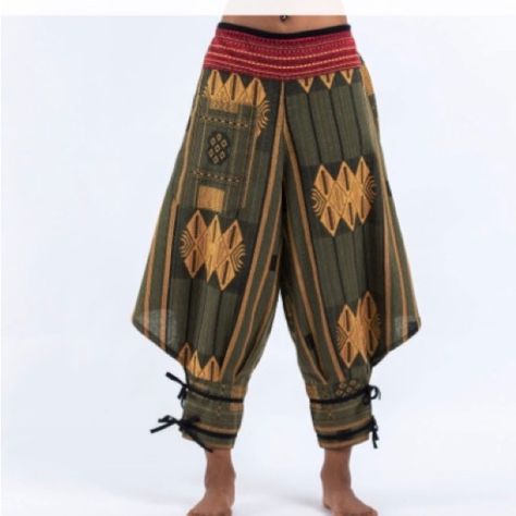 Nwot Beautifulthai Hill Tribe Fabric Woman’s Harem Pants With Ankle Straps. The One In The Model Image Is Different Color Accent, They Are Almost Same Style Partially Open Side Legs, Stretch In The Back Portion Of The Waist, Multiple Colors( Mustard, Brown Black )(Black And White On The Ankles And Front Of Waist. )There Is No Brand Tag Or Size Tags It Fit Size, Small Or Medium ,(3 Rd Photo Shows Similar Style On The Model )Please Double Check All The Photos For Measurements And Details. It Can S Traditional South African Clothing, Traditional West African Clothing, Hawaiian Fashion Traditional, Desert Clothes Women, Loose Fantasy Clothing, Fox Aesthetic Outfit, Gender Neutral Fits, Berber Fashion, African Street Fashion