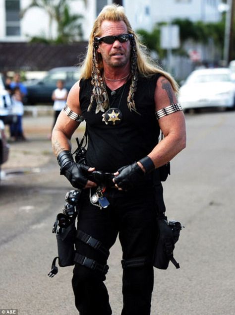 Hit show: Duane is shown in a still from A&E's Dog The Bounty Hunter Beth The Bounty Hunter, Hunter Costume, Texas Prison, Hunter Dog, Dog The Bounty Hunter, Reality Tv Shows, Bounty Hunter, Couple Halloween, Couple Halloween Costumes