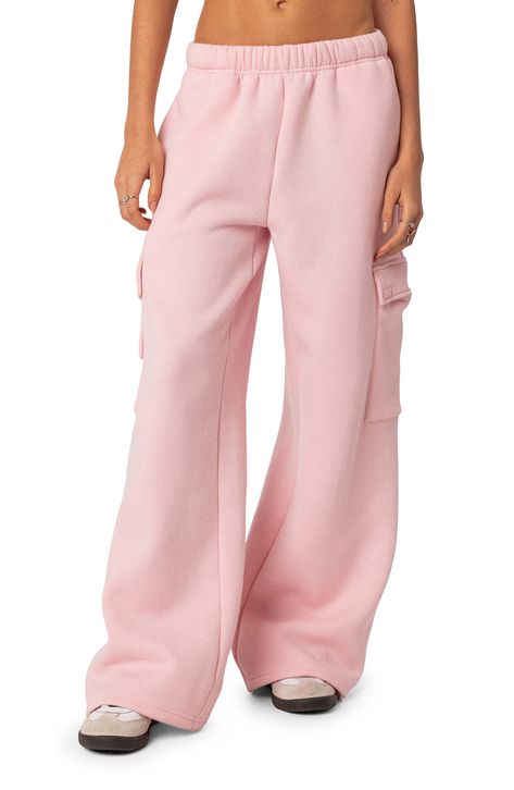 Lounge or go out in comfy fleece sweatpants made with cargo pockets and full-length wide legs for trend-right updates. Elastic waist Side flap-patch pockets; back flap-patch pockets 100% cotton Machine wash, dry flat Imported Oversized Sweatpants, Cute Sweatpants, Cargo Sweatpants, Hip Hop Pants, Pink Sweatpants, Fall Pants, Wide Leg Sweatpants, Cute Pants, Cargo Pants Women