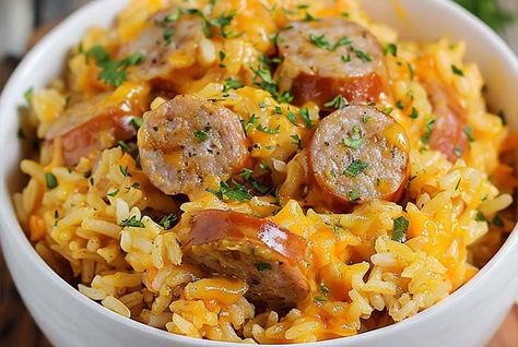 Cheesy Sausage and Rice Recipe - Masters of Kitchen - Recipes Yellow Rice And Sausage Recipe, Cheesy Sausage And Rice, Sausage And Rice, Green Salad Dressing, Smoked Sausage Recipes, Yellow Rice, Tried And True Recipes, Creamy Cheese, One Pan Meals