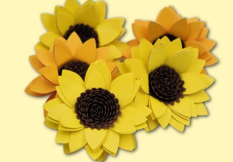 Looking for a beginner cricut tutorial on how to make paper flowers - in particular, paper sunflowers? This easy paper sunflower tutorial also includes a link to my FREE downloadable SVG sunflower file template - and you definitely don't want to miss it! Whether you're looking to DIY a homemade gift, or want to beautify your home with DIY home decor - these cricut paper sunflowers fit the bill! We have a TON of free SVG files you can download, so come see today! Cricut Sunflower, Cardstock Paper Crafts, Sunflower Template, Sunflower Paper, Cabinet Painting, Paper Sunflowers, Sunflower Svg, Sunflower Cards, Painting Kitchen