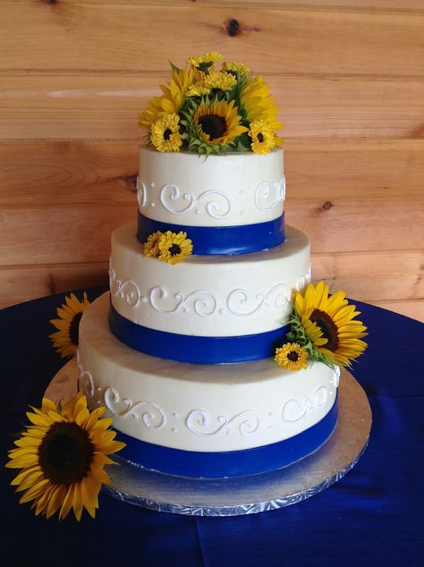 Sunflowers accent this royal blue sugar paste band  - wedding cake Wedding Cakes Sunflower, Wedding Baking, Royal Blue Wedding Cakes, Sunflower Wedding Cake, Royal Blue Bridesmaids, Sunflower Wedding Ideas, Sunflower Cake, Royal Blue Bridesmaid Dresses, Rustic Wedding Backdrops