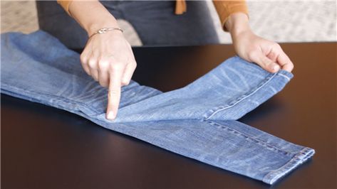 This genius trick will forever change how you pack jeans Folding Jeans To Save Space, How To Fold Jeans, How To Fold Pants, Folding Jeans, Suitcase Packing Tips, Rolled Jeans, Rolled Up Jeans, Packing Clothes, Crochet For Beginners Blanket