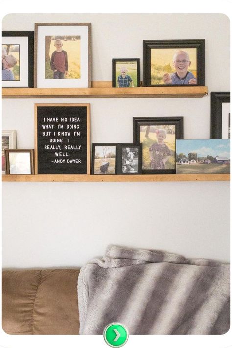 Personalized family gallery shelf above the couch creates a warm and inviting vibe, showcasing cherished family photos in a personal yet stylish way. Wall Shelf Above Couch, Above Couch Ideas, Shelf Above Couch, Gallery Wall Shelf, Gallery Wall Shelves, Gallery Shelf, Above The Couch, Gallery Shelves, Couch Ideas