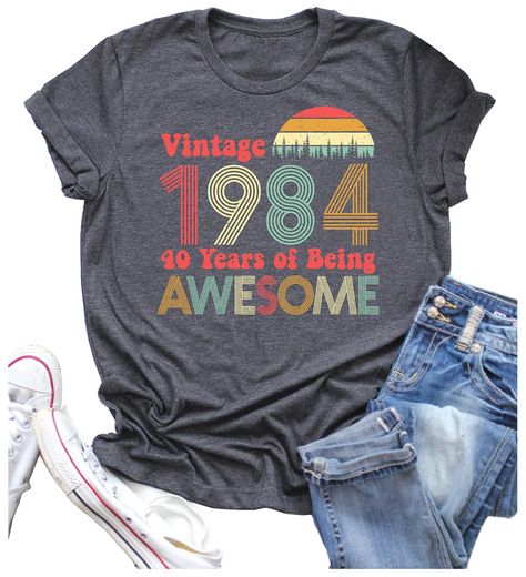 PRICES MAY VARY. 40 Years T-shirts Material: Cotton Blend, Durable, Breathable ,Skin-friendly, SUPER SOFT and COMFORTABLE to Wear. Bust: S(37.01'') M(38.58'') L(40.94'') XL(42.52'') XXL(44.00''). Funny 40th Birthday Gifts : Vintage 1984 Original Parts Shirts for Women, Short Sleeve Crew Neck Loose Casual T Shirt Party Tees ,1984 40th Birthday Retro Color Tops Features a Retro 80's Color Scheme, Distressed font and Simple Cool Design Make This Awesome Funny Birthday Shirt. Occasion: Perfect For 4 40th Birthday Shirts Women, 1984 Shirt, 40th Birthday For Women, Funny Birthday Shirts, 40th Birthday Funny, 40th Birthday Shirts, 40th Birthday Gifts, Drinking Shirts, Party Tops