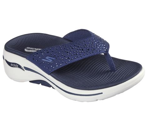 Add some sparkle to your day with Skechers GO WALK Arch Fit Sandal - Dazzle. This sporty thong sandal features a soft fabric upper with rhinestone detail, lightweight ULTRA GO cushioning, high-rebound Comfort Pillar technology, and a contoured Goga Mat footbed with podiatrist-certified Arch Fit support. | Skechers Women's GO WALK Arch Fit - Dazzle Sandals | Medium Width | Patented Skechers Arch Fit contoured footbed with podiatrist-certified arch support | Podiatrist-designed shape developed wit Skechers Go Walk, Support Design, Wide Shoes, Skechers Women, Kids Luggage, 4 Inch Heels, Designer Sandals, Luxury Store, Personal Marketing