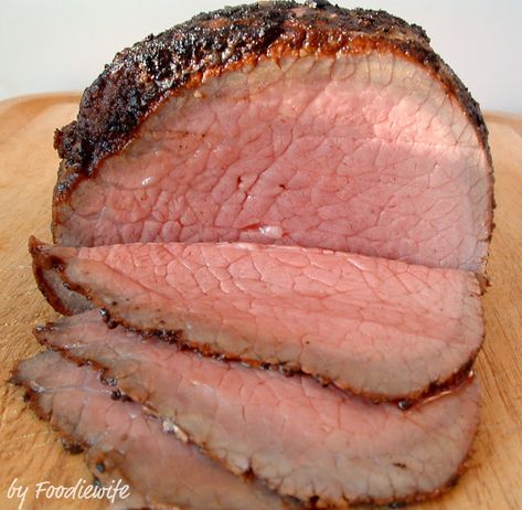 Cooks Illustrated has the most popular way to cook eye of round roast. Saving this recipe as it has times and temps, as well as how long to cook for rare, medium rare or medium. On e-how, they recommend browning in the oven: same prep, 400 degrees for 15 minutes to brown, then 1.5 hours at 325 for rest of cooking. Inside Round Roast Recipe, Slow Roasted Beef, Cooks Illustrated Recipes, Eye Of Round, Roast Meat, Roasted Beef, Roast Beef Sandwiches, Roast Beef Recipes, Round Roast