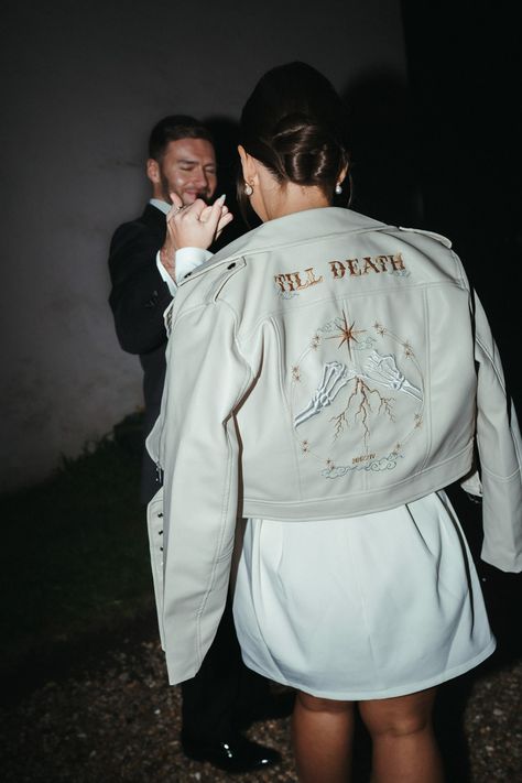 Dare to be different on your big day with our customized, leather Bride Leather Jackets, featuring zodiac embroidery and pinky promises. Perfect for bridal cover-ups, these edgy ivory cropped jackets are sure to turn heads as you walk down the aisle! Couple Pinky Promise, Embroidery Skeleton, Bride Leather Jacket, Zodiac Embroidery, Hungry Jacks, Edgy Wedding, Skeleton Couple, Bride Jacket, Wedding Shrug