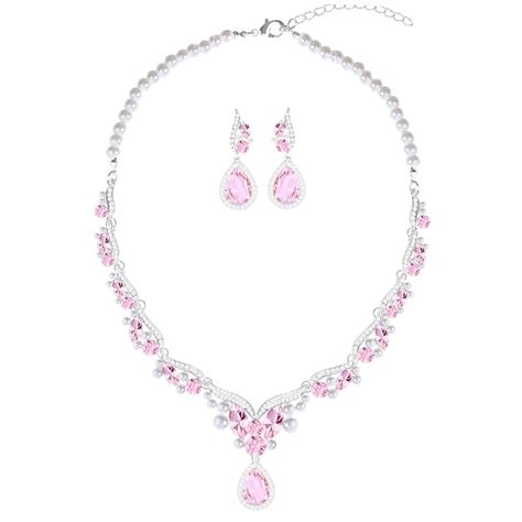 PRICES MAY VARY. Pink rhinestone necklace earrings set for women bride night out various event Bling Bling Pink necklace earrings jewlery set fully set wtih 301 pcs crystal diamond,gorgeous and sparkling Ideal necklace earring jewlery gift well packed with box for women mom wife mother on mothers day Anti-tarnishing treated by electronic coating on surface  Bling bling Necklace Earrings jewlery set with fully paved rhinestone Pink necklace earrings set for varius event dress Pink And Black Necklace, Hoco Necklaces, Pink Necklaces, Bride Birthday, Bridal Pearl Necklace, Emerald Blue, Women Bride, Bling Necklace, Pearl Necklace Earrings