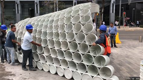 wave of buckets floods mextropolis architecture festival in mexico city Upcycle Plastic, A Frame House Plans, Dome House, A Frame House, Parking Design, Street Design, Public Spaces, Outdoor Art, Buckets