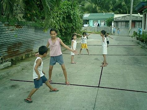 Patintero : A Filipino Kid's Game/Pass Time Batang 90s Games, Patintero Game, Filipino Nostalgia, Filipino Childhood, Philippines Street, Page Background Design, 2000s Childhood Memories, 90s Games, Robot Wallpaper