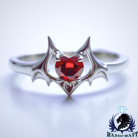 I think we've ALL fallen in love with a vampire or two during our lives, so we created a special "Drac's Daughter" Inspired engagement ring, perfect for the dark and alluring, vampiric bride!  Comes in your choice of solid sterling silver or solid white gold, Featuring a brilliant Swarovski Blood Ruby that can be exchanged if red isnt your color! Also, if you want it in black gold, feel free to shoot us a message, and we will be happy to make a custom version especially for you! Starting Price: Black And Red Accessories, Vampire Engagement Ring, Vampire Rings, Gothic Accessories Jewellery, Vampire Ring, Engagement Ring Ruby, Vampire Jewelry, Blood Ruby, Gothic Engagement Ring