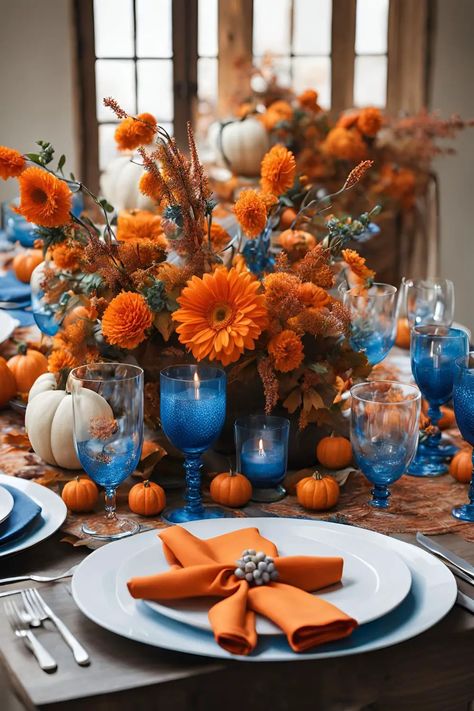 Top 25 Thanksgiving Table Decor Ideas to Match Any Style – From Classic to Modern - RectifyHome Blue And Orange Fall Decor, Orange Fall Decor, Thanksgiving Table Decor Ideas, Thanksgiving Table Decor, Blue Tablecloth, Orange Party, Orange Table, Blue Napkins, Table Decor Ideas