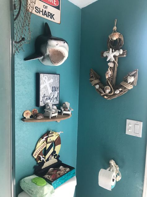 Shark above toilet- beach bathroom 🦈 #beachbathroom #sharkhead #mermaid Jaws Bathroom Theme, Jaws Bathroom, Shipwreck Bathroom, Kids Ocean Bathroom, Sea Bathroom Ideas, Kids Beach Bathroom, Pirate And Mermaid Bathroom, Bathroom Decor For Kids, Shark Bathroom Decor