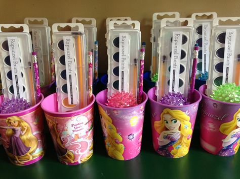 Rapunzel party favors. Paint labels from pagingsupermom.com. Pencils, light up bouncy balls, watercolors and note pads inside plastic cups. Bolo Rapunzel, Tangled Birthday Party, Rapunzel Birthday, Rapunzel Birthday Party, Tangled Birthday, Princess Theme Birthday, Rapunzel Party, Tangled Party, Princess Theme Birthday Party