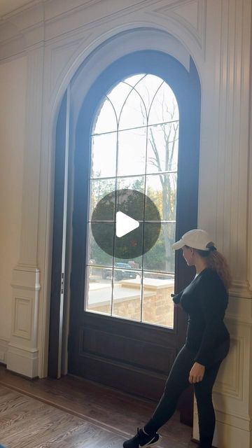 Cindy Alberding on Instagram: "Happy Friday to anyone who gets to finally walk through the front door at Rosedown! This viral door I designed, might just be my favorite yet! This massive, 10-foot-tall, arched entryway lets the sun stream in when it shines. But when my client is wanting privacy, I designed a set of pocket doors, for them to shut in for the night. I mustn’t forget to mention- the doors were basic paint grade, so we faux’d the stained finish. 🥰 Designer: @cindyalberding Architect: @c3studiollc Builder: @artisansignaturehomes @artisansignature Carpenter: @chaballa8519 Decorative painter: @artistkendean Designer: @cindyalberding Architect: @c3studiollc Builder: @artisansignaturehomes @artisansignature Carpenter: @chaballa8519 Decorative painter: @artistkendean # Arched Entryway, Arch Entryway, Pocket Doors, Home Room Design, Porch Ideas, The Doors, House Rooms, Happy Friday, Front Door