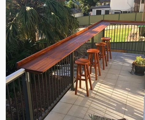 Make the most of your balcony with a railing bar - ideacious Deck With Bar Railing, Deck With Bar Counter, Deck Rail Bar, Railing Bar, Railing Table, Bar En Plein Air, Porch Bar, Deck Bar, Patio Railing