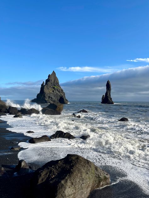 Discover the otherworldly beauty of Reynisfjara Beach in Iceland! 🌊✨ Famous for its jet-black volcanic sand and towering basalt sea stacks that rise dramatically from the ocean, this place feels like something straight out of a fantasy film. Whether you're a nature lover, adventurer, or photography enthusiast, Reynisfjara’s raw, untamed landscapes will leave you speechless. Picture the contrast of dark stone, crashing waves, and a sky that seems to go on forever—an unforgettable slice of Iceland's magic! Perfect for your bucket list! 🖤 #Wanderlust #ReynisfjaraBeach #iceland #TravelGoals Reynisfjara Beach Iceland, Reynisfjara Beach, Nordic Travel, Otherworldly Beauty, Iceland Trip, Black Beach, Fantasy Films, Black Sand Beach, Crashing Waves