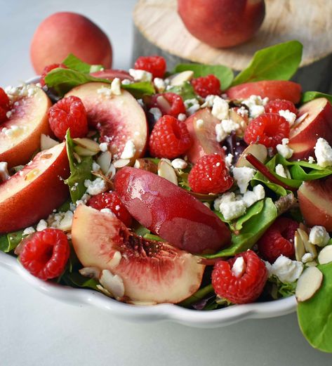 White Peach Raspberry Almond Salad. Fresh white peaches or nectarines, plump raspberries, candied almonds, creamy feta or white cheddar cheese all tossed with a sweet dressing. The perfect summer raspberry peach salad. www.modernhoney.com Greek Yogurt Breakfast Bowl, Watermelon Arugula Salad, Yogurt Breakfast Bowl, Almond Salad, White Peaches, Modern Honey, Sweet Dressing, Peach Raspberry, Creamy Feta